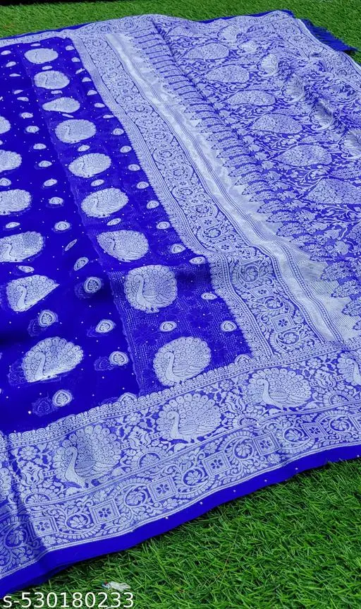 Trendy Georgette Fabric Zari Weaving Saree with Svorkshi Work and Tassels and Latkan  - amamestyle